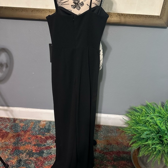 Bebe NWT jumpsuit. Black. Sexy slits up leg. Has stretch. Xs - Picture 4 of 6